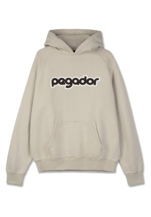 Bēšs ar kapuci, sporta krekls ar kangaroo kabatu, ar lielu tumši brūnu 'pegador' logo, kas ir norobežots ar baltu. Mīksta, teksturēta auduma.