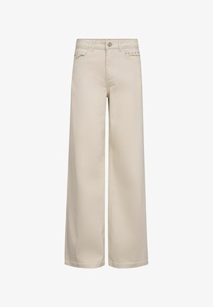 Bež traperice širokih nogavica s visokim strukom, prednjim gumbom, petljama za remen i malim metalnim nitnama na rubovima džepova.