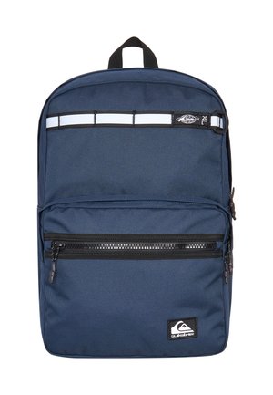 Navy blue backpack featuring a front zip pocket, reflective straps, and a logo patch. Made of durable fabric with a smooth texture.