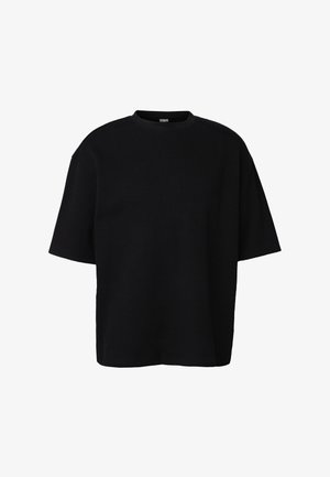 Fekete, rövid ujjú, waffle mintás, kerek nyakú póló laza szabással és finom textúrájú mintázattal.