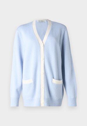 Light blue cardigan made of soft material, featuring a V-neck, white trim, and two front pockets. Button closure down the front.