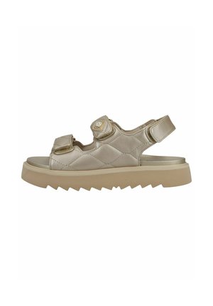 Sandalo beige trapuntato con suola spessa, cinturini regolabili in velcro sulle dita e alla caviglia, e suola esterna testurizzata a zigzag.