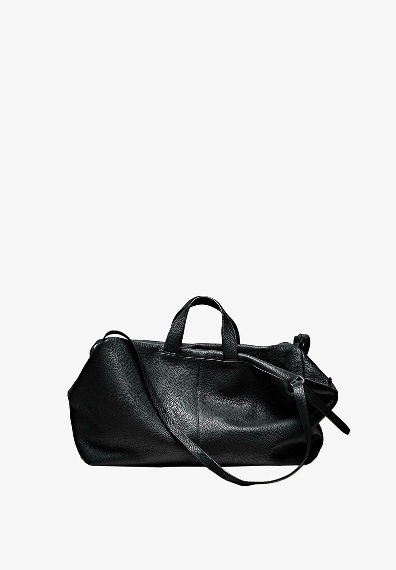 Black leather duffel bag with textured surface, dual short handles, detachable long strap, and zip closure. Oval shape, minimalistic design.