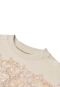 Beige sweatshirt featuring a floral print in pink and yellow hues, rounded neckline, and ribbed cuffs. Soft cotton material with a relaxed fit.