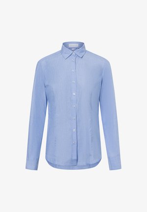 Light blue long-sleeve shirt with a pointed collar, buttoned front, and curved hem. Fabric has a subtle texture and finish.