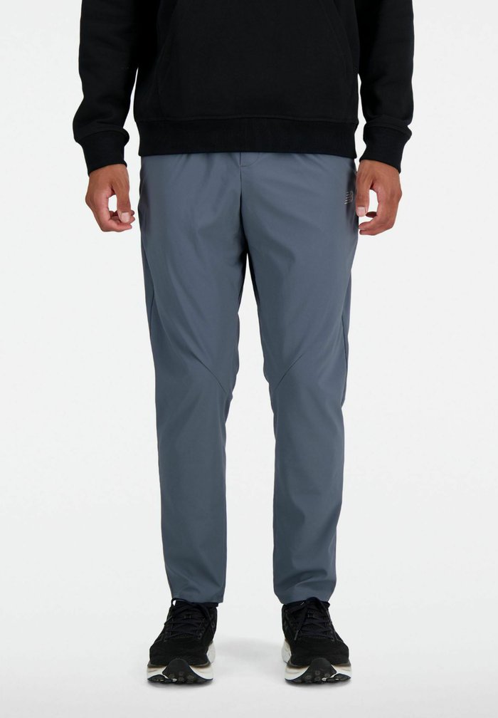 New Balance AC STRETCH REGULAR - Tracksuit bottoms - graphite