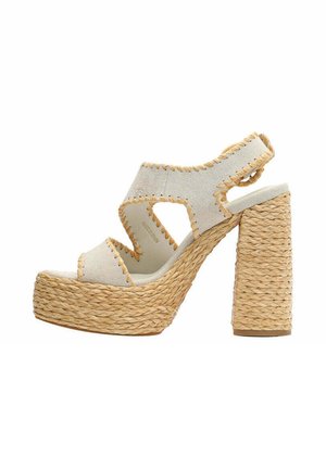 Sandalo platform aperto in beige scamosciato con tacco spesso in juta intrecciata e bordo cucito lungo i cinturini e i bordi.
