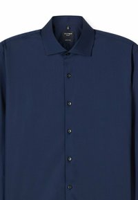 Chemise bleu marine à manches longues en tissu lisse, dotée d'un col classique, de six boutons et d'une coupe très ajustée.