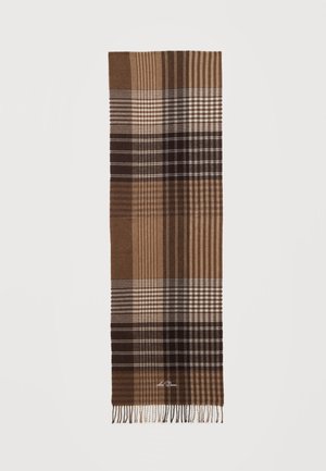 Écharpe en laine à carreaux marron et beige avec des extrémités à franges et un texte brodé discret près du bord inférieur sur fond uni.