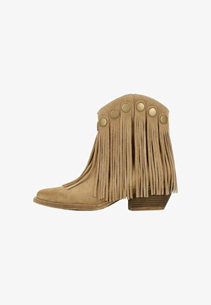 Fringe ankle boots made of tan suede with a rounded toe and slight heel, featuring decorative gold-tone buttons along the side.