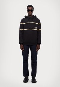 EA7 Emporio Armani TRAIN ATHLETIC HOODIE - Sweatshirt - black/gold