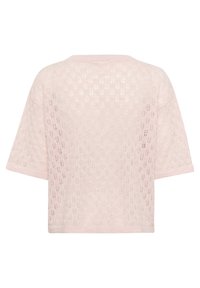 Top en tricot rose clair, présentant une coupe ample avec des manches courtes, un motif en tissage ouvert, et un col et un ourlet côtelés.