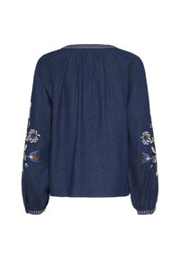 Blouse bleu foncé à manches longues avec broderies florales sur les manches, encolure froncée et poignets élastiques.