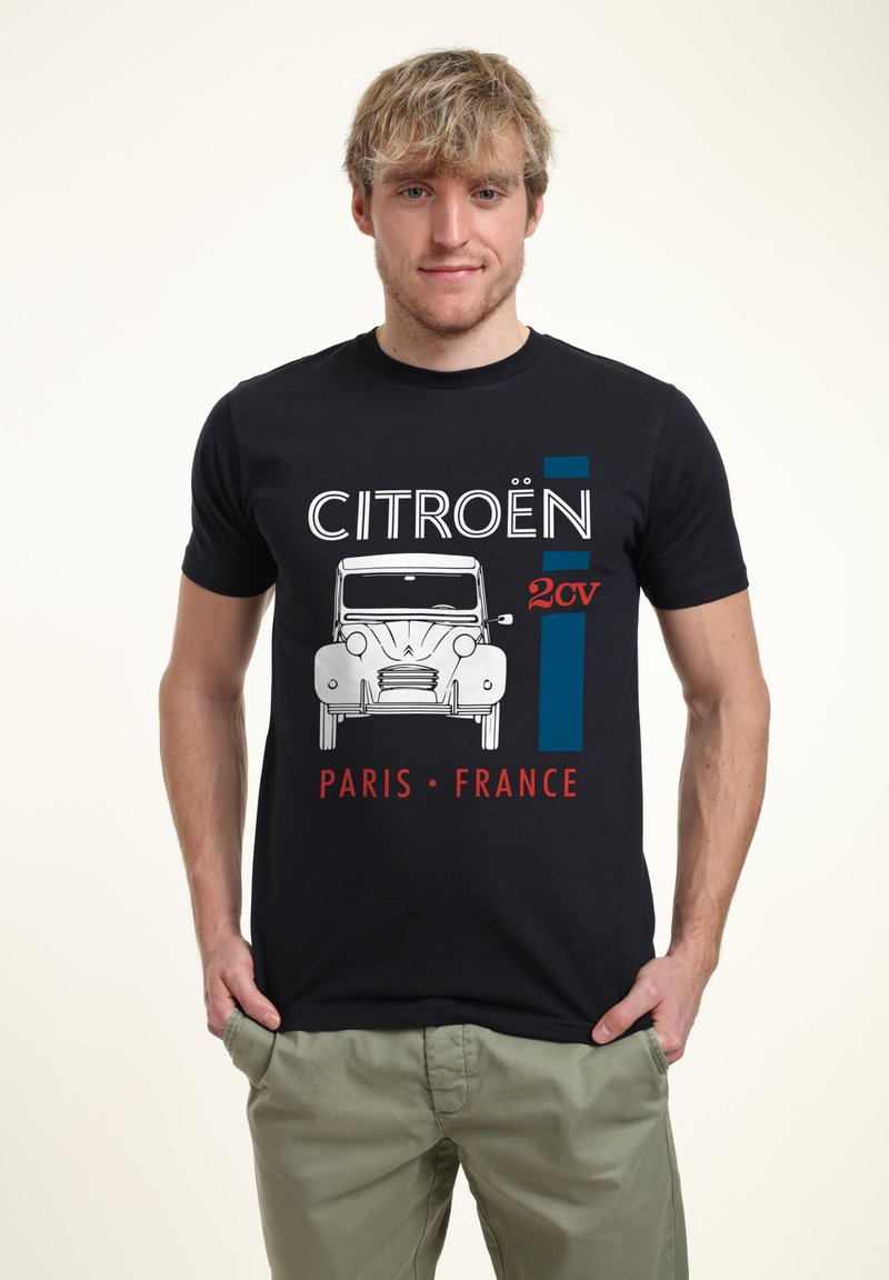 Černé tričko s bílou grafikou Citroën 2CV, červeným textem "PARIS • FRANCE" a modrými akcenty, vyrobené z bavlny s klasickým střihem.