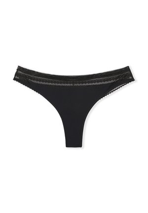 Zwarte string van vrouwen met een doorschijnende kanten tailleband en geschulpte randen, getoond tegen een witte achtergrond.