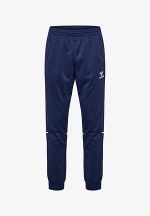 Marineblauwe sportbroek met elastische tailleband, zijzakken, omgeslagen enkels en wit logo aan de rechterdij.