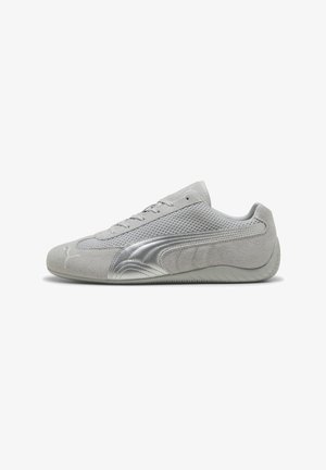 Gray athletic shoe featuring a suede upper, mesh panels, silver accents, and a textured rubber sole. Includes laces for a secure fit.