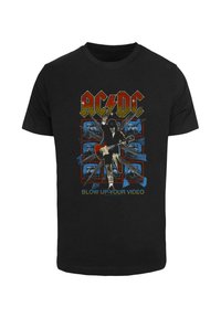 Black cotton t-shirt featuring AC/DC graphic. Design includes colorful text, a guitarist, and retro TV screens as background elements.