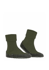 Calze verde a maglia con un bordo a coste e una suola in feltro grigio texturizzato, dotate di punti bianchi per una presa migliore. Design morbido e aderente, ideale per l'uso domestico.