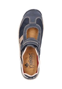 Navy slip-on shoe with a textured upper, mesh accents, adjustable strap, and beige detailing. Designed for comfort, featuring a soft insole.