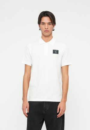- Koszulka polo