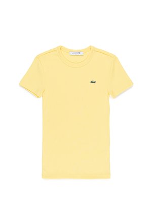 Gelbes kurzärmliges T-Shirt aus gerippter Baumwolle, mit Rundhalsausschnitt, slim fit und einem kleinen grünen Lacoste-Logo auf der Brust.