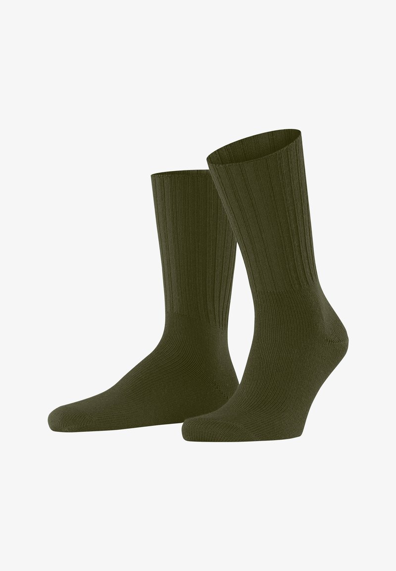 Olivgrüne, gerippte Socken in mittlerer Wadenhöhe; verfügen über ein festes, strukturiertes Muster sowie verstärkte Zehen- und Fersenbereiche für erhöhte Haltbarkeit.