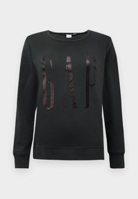 Musta pitkähihainen crewneck-huppari, jossa suuri kiiltävä "GAP"-logo edessä sekä resorit hihoissa ja helmassa.
