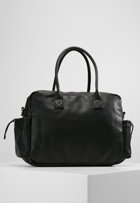 Black leather handbag with a structured design, featuring two top handles and an additional side pocket. Smooth texture with minimal hardware.