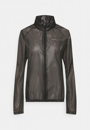 Veste légère noire à fermeture éclair, col haut, manches longues, poignets et ourlet élastiques, avec un petit logo sur le côté gauche de la poitrine.