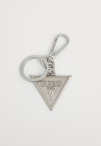 Silver triangular keychain featuring "GUESS" embossed, textured surface, attached to a metal clip and keyring for easy attachment.