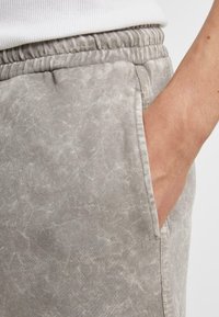 Urban Classics WASHED PIPED - Tepláky - steelgrey