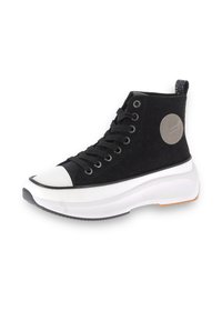 High-top black sneakers with a textured fabric upper, white rubber sole, and circular logo patch on the side. White toe cap detail.