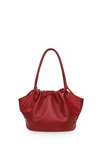 Red leather tote bag with a drawstring closure, soft texture, and two handles; features a subtle logo on the front.