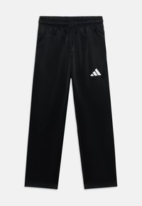 Μαύρο αθλητικό παντελόνι με ελαστική ζώνη μέσης και κορδόνι, με λευκό τρίγωνο λογότυπο στο δεξί μηρό.