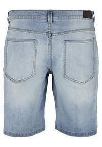 Denim shorts i lys blå med en falmet finish. Har fem lommer, synlig søm og en talje. Kort længde og lige pasform.