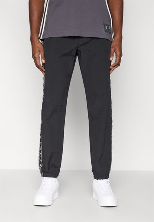 SPORTS INSPIRED ELASTIC CUFF PANTS WITH TAPE DETAILING - Pantaloni de trening - black