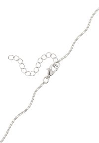 Srebrna metalowa bransoletka łańcuchowa z zapięciem typu homar i regulowaną długością. Posiada małe okrągłe ogniwa oraz gładką teksturę powierzchni.