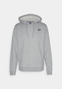 Šedá mikina s kapucí vyrobená z měkkého materiálu. Obsahuje přední klokanní kapsu a logo Reebok na levém prsu. Klasický střih s žebrovanými manžetami.