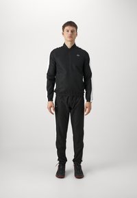Lacoste Sport TRACKSUIT - Tuta - noir/blanc