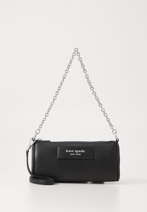 Black leather handbag with a zip closure, silver chain strap, and a rectangular logo patch. Compact rectangular shape with smooth texture.