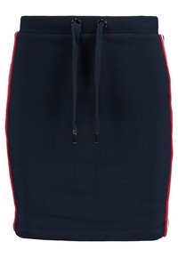 Gonna blu navy con vita elasticizzata, lacci blu navy e strisce verticali rosse su entrambi i lati.