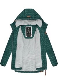 Grön zip-up jacka med ett zigzag-mönster, mjuk vit foder, huva och en etikett med blommönster inuti.