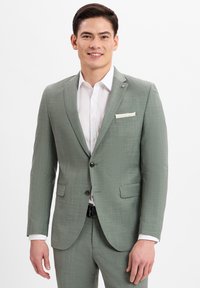 Helle grüne Blazer mit strukturierter Musterung, Ein-Knopf-Verschluss, zwei vorderen Taschen und weißem Einstecktuch, kombiniert mit einem weißen Hemd.