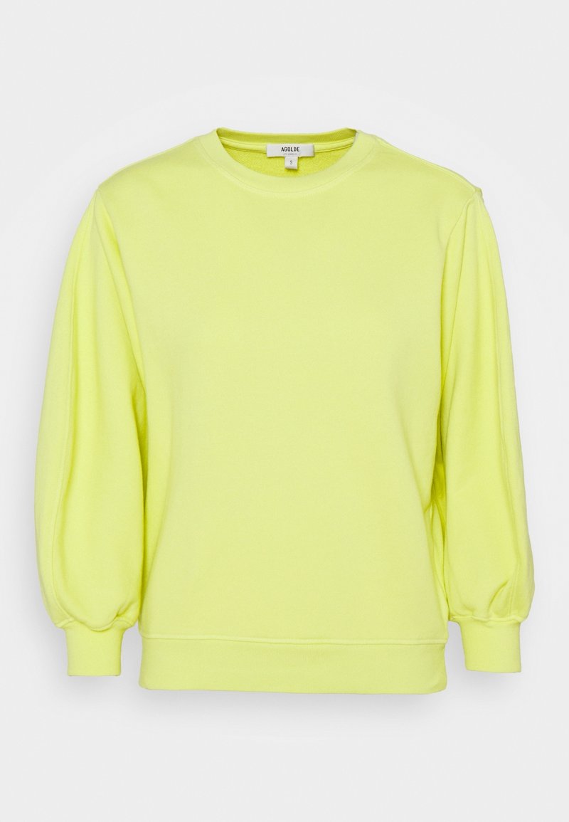 Sweat-shirt jaune néon à manches longues avec manches bouffantes et poignets côtelés, col rond et petite étiquette de marque à l'intérieur du col.