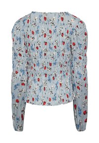 Blusa con motivo floreale, caratterizzata da fiori blu e rossi su tessuto a righe bianche e blu. Presenta un retro arricciato e maniche lunghe.
