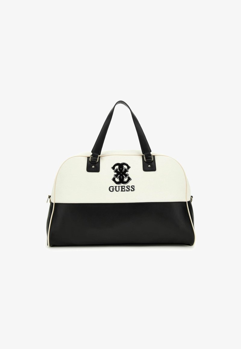 Borsa duffel in bianco e nero con corpo in tela, dettagli neri lucidi, logo stampato e doppie maniglie. Presenta una chiusura con zip.