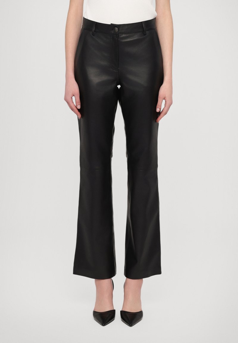 STUDIO ID DANA  - Leather trousers - black
