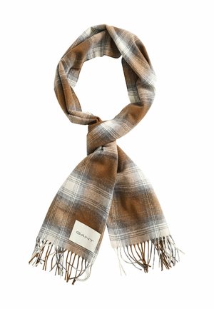 Écharpe à carreaux marron, blanche et grise avec des extrémités à franges et une étiquette blanche portant la mention GANT, nouée lâchement et présentée sur fond blanc.
