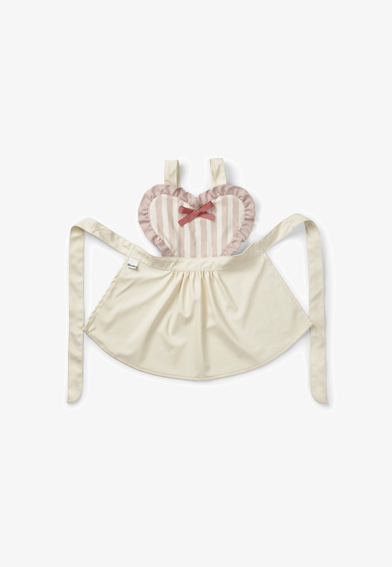 Hjerteformet forklæde lavet af cremefarvet stof med pink stribet front. Har flæsekanter og en lille sløjfe i midten. Justerbare stropper.